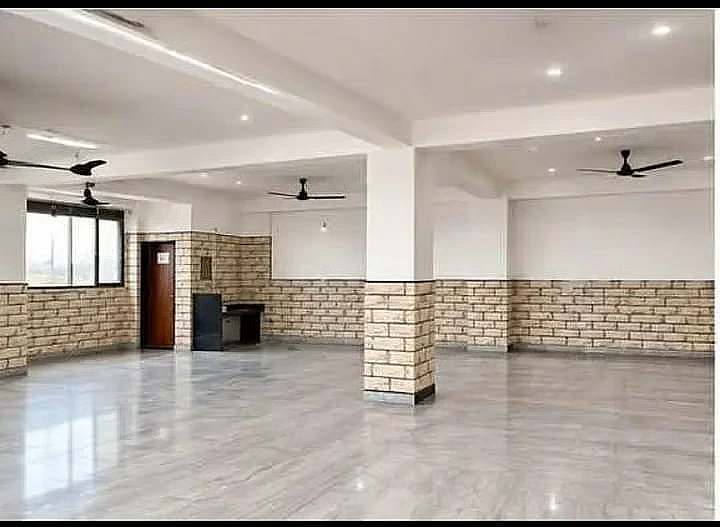 A 1300 sqft hall with a 400 sqft rest area is available for rent in Sevashram, Udaipur